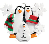 Penguins making a snowman 2 Christmas Ornament - 704-2